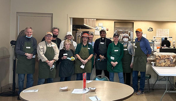 St. Mark Parishioners and Fr. Santhosh Helping at Our Daily Bread